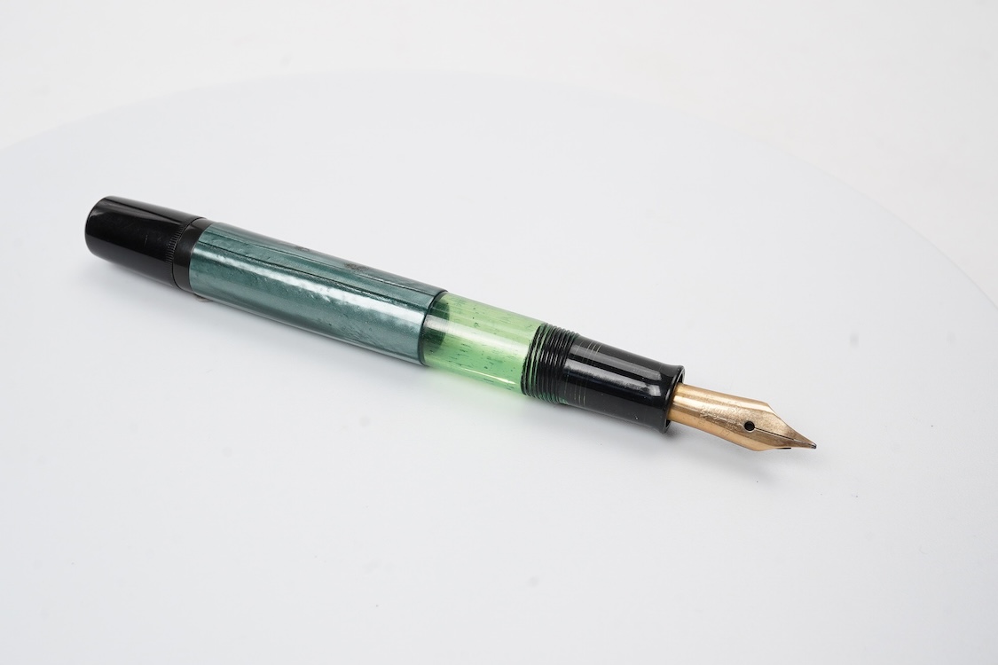A Pelikan 100N fountain pen fitted with a 14ct. gold Pelikan nib